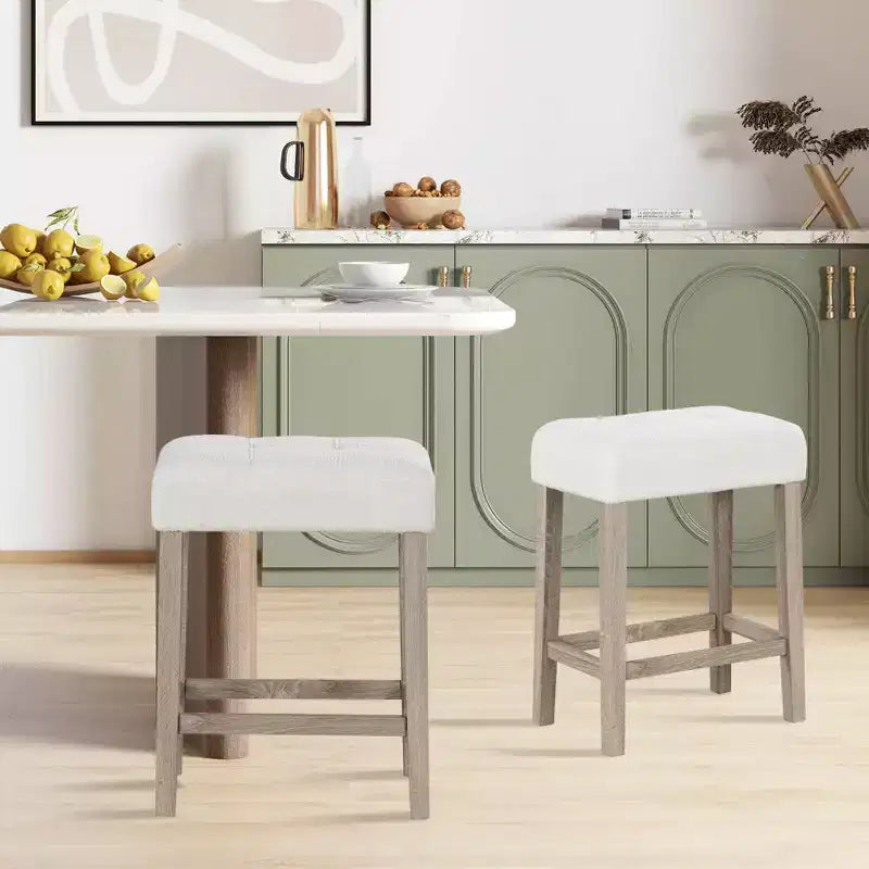 Set di 2/4 sgabelli da bar senza schienale ad altezza bancone con poggiapiedi e gambe in legno di gomma – Moderno