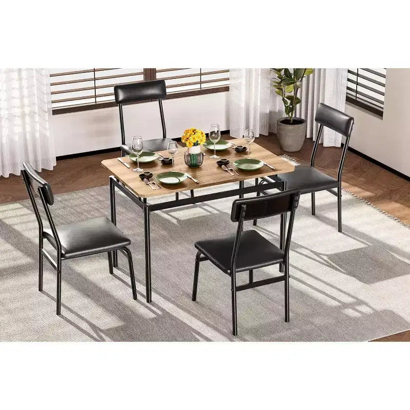 Set da pranzo 5 pezzi per 4 persone – Piano effetto legno, gambe in metallo nero e sedie imbottite
